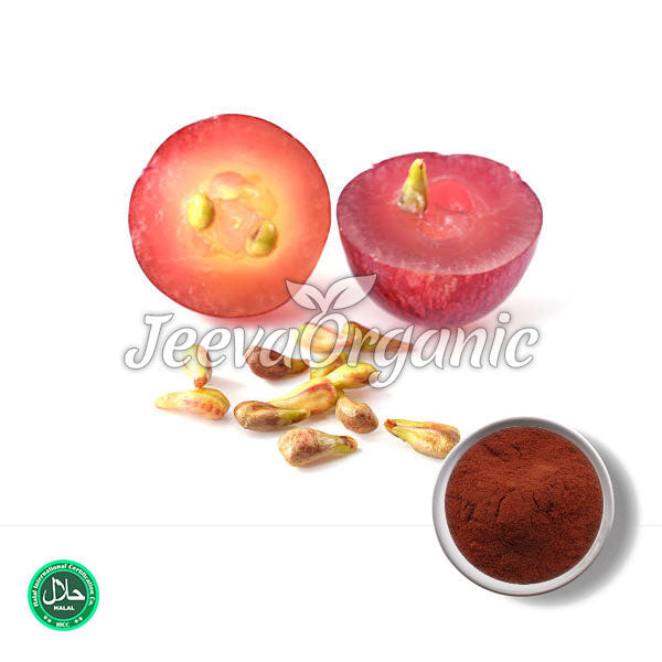 Two halves of a fresh red fruit with seeds scattered below, accompanied by a small bowl of brown powder, labeled "Jeeva Organic."