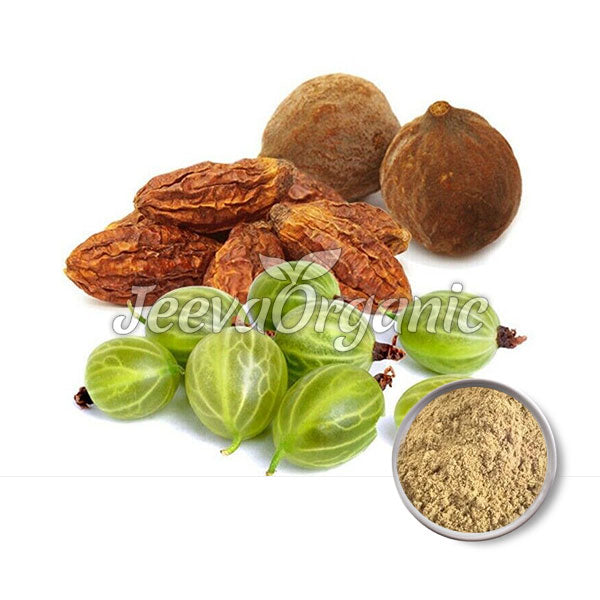 Aromatic herbs including dried reishi, amla fruit, and a bowl of herbal powder, showcasing natural wellness ingredients.