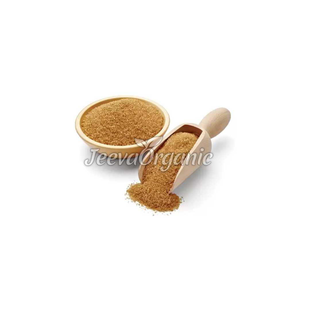 A container of organic cane sugar powder, a fine, white to off-white crystalline powder made from ground organic sugar cane, used as a natural sweetener in baking, cooking, and beverages.