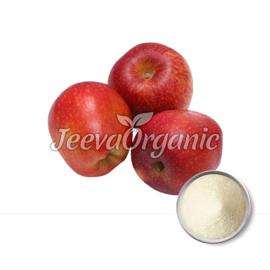 Three fresh red apples beside a small bowl of apple powder, featuring the "Jeeva Organic" logo prominently.