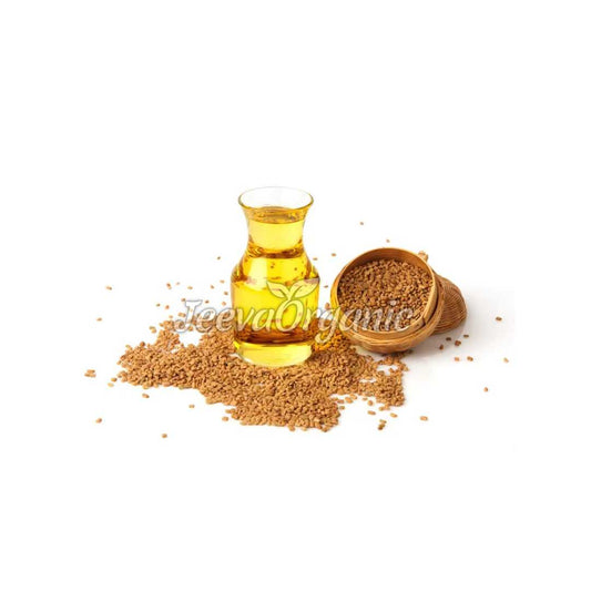 A bottle of organic fenugreek oil, a golden to amber-colored liquid with a distinctive nutty aroma, extracted from fenugreek seeds and used in culinary and wellness applications.